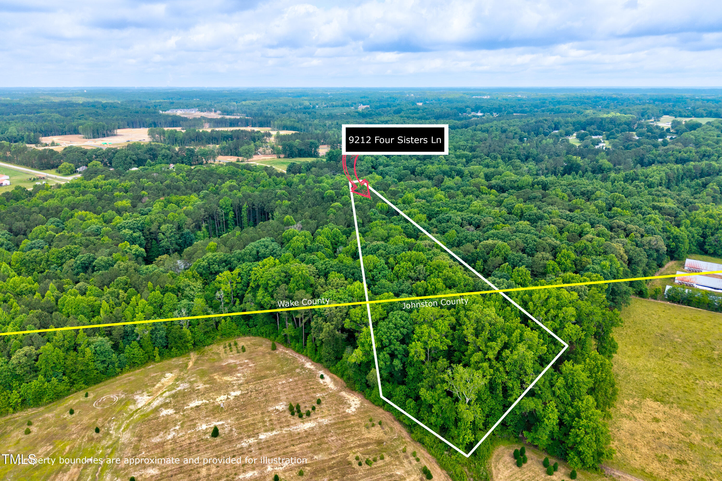 9212 Four Sisters Lane Willow Spring, NC 27592 - Photo 2 of 8 a view of a balcony with an outdoor space