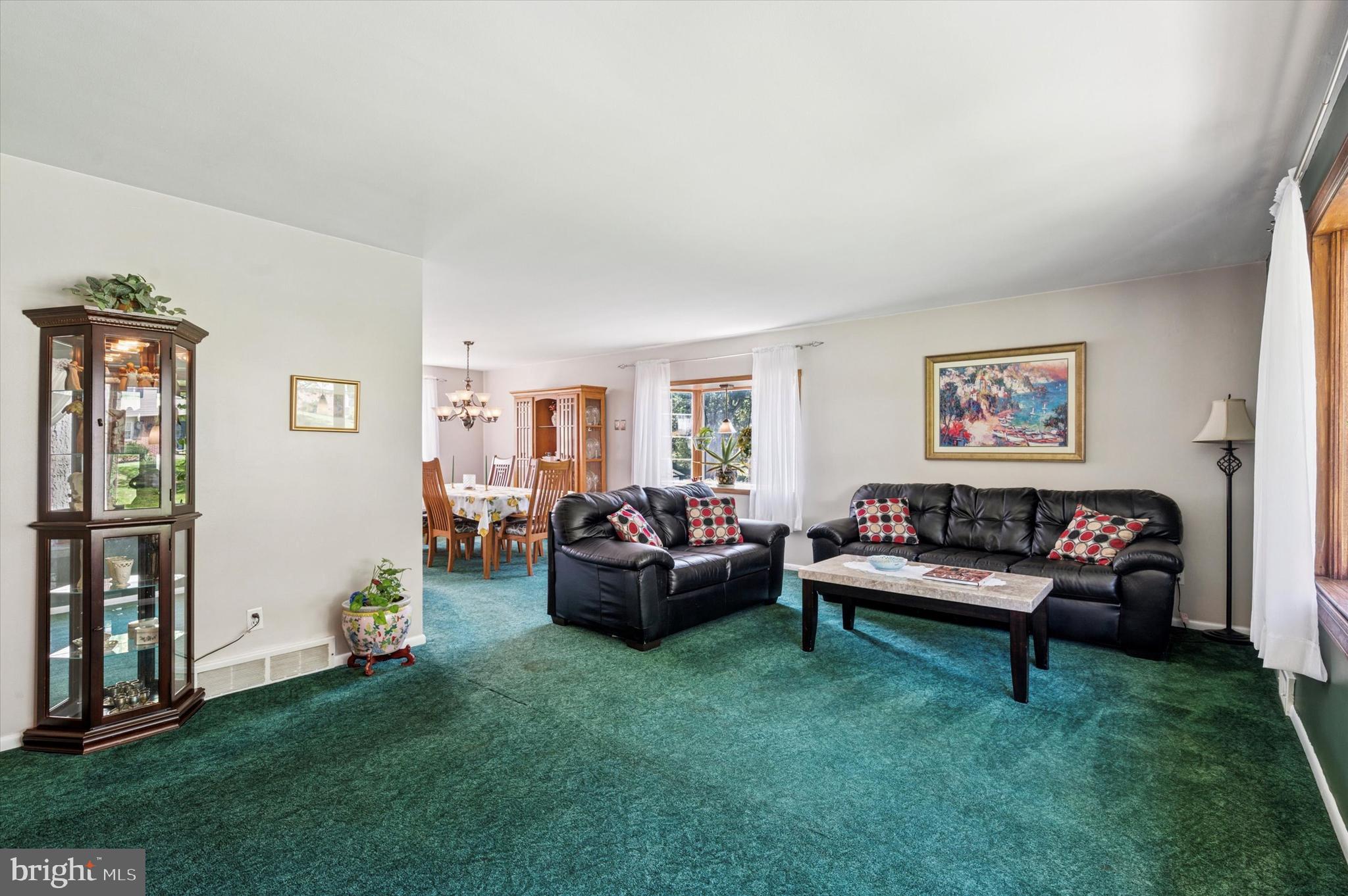 1007 Glen Road Wallingford, PA 19086 - Photo 11 of 50 a living room with furniture and a window