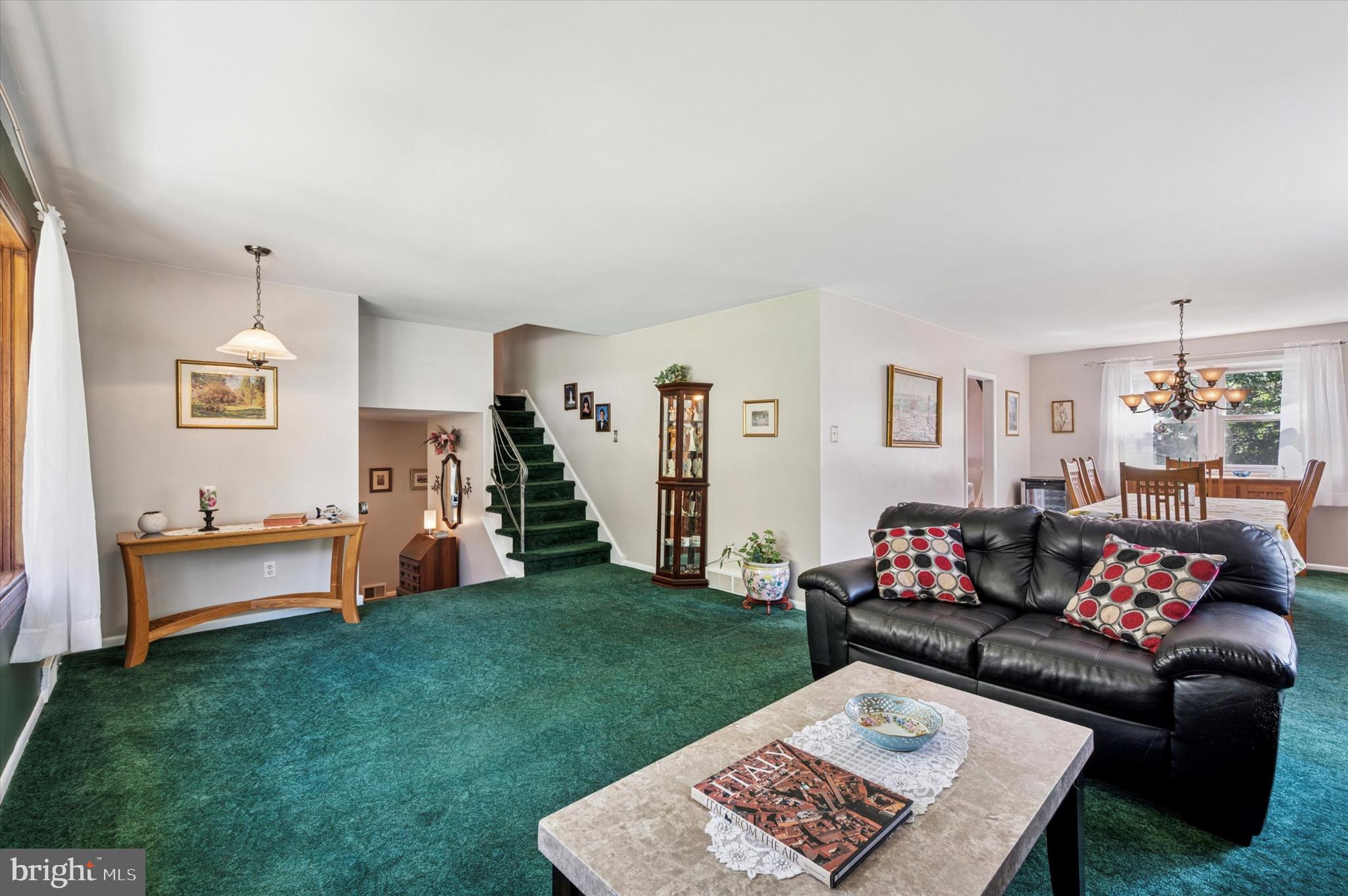 1007 Glen Road Wallingford, PA 19086 - Photo 12 of 50 a living room with furniture and a rug