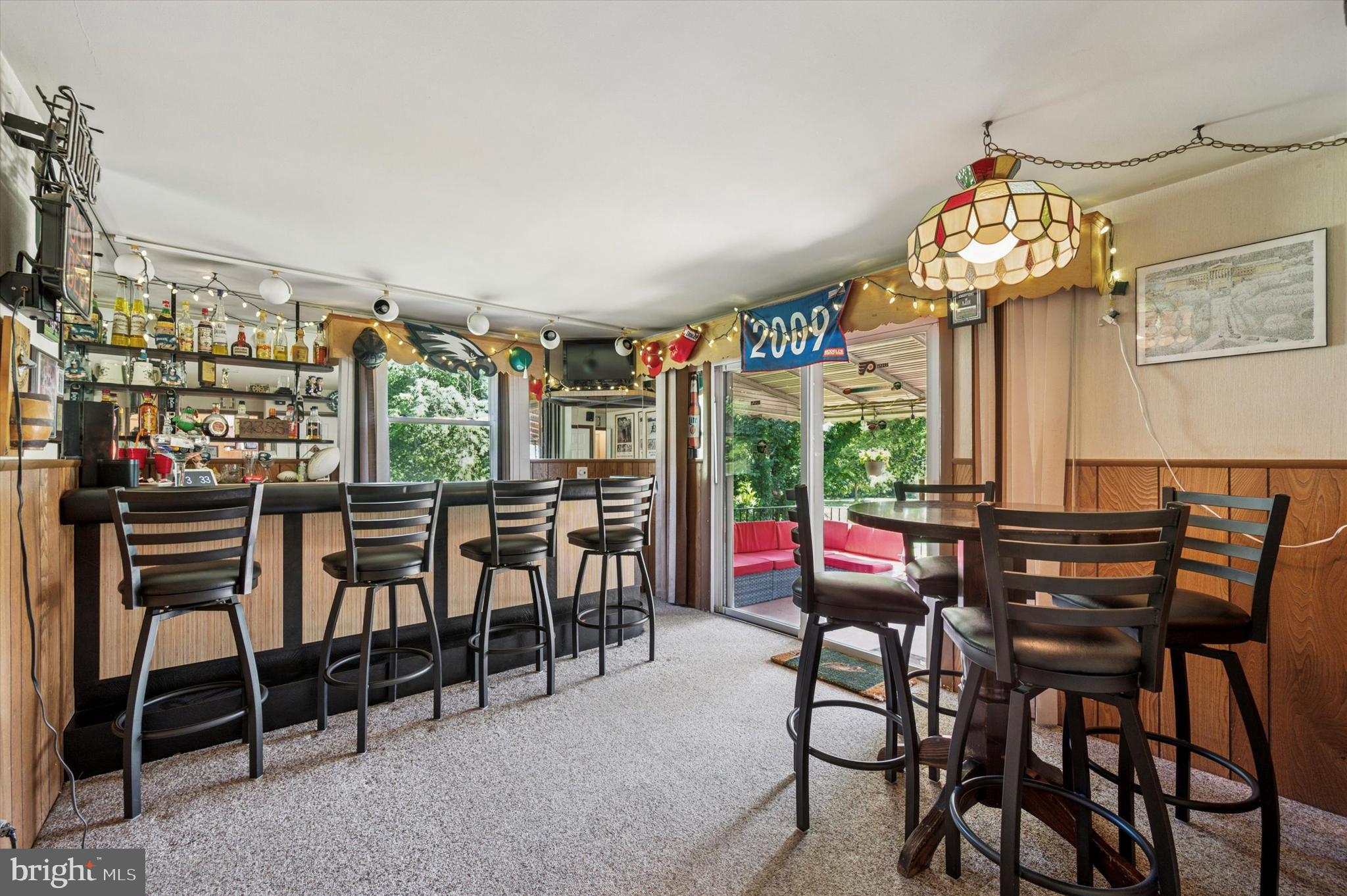 1007 Glen Road Wallingford, PA 19086 - Photo 22 of 50 a view of a dining room with furniture window and outside view