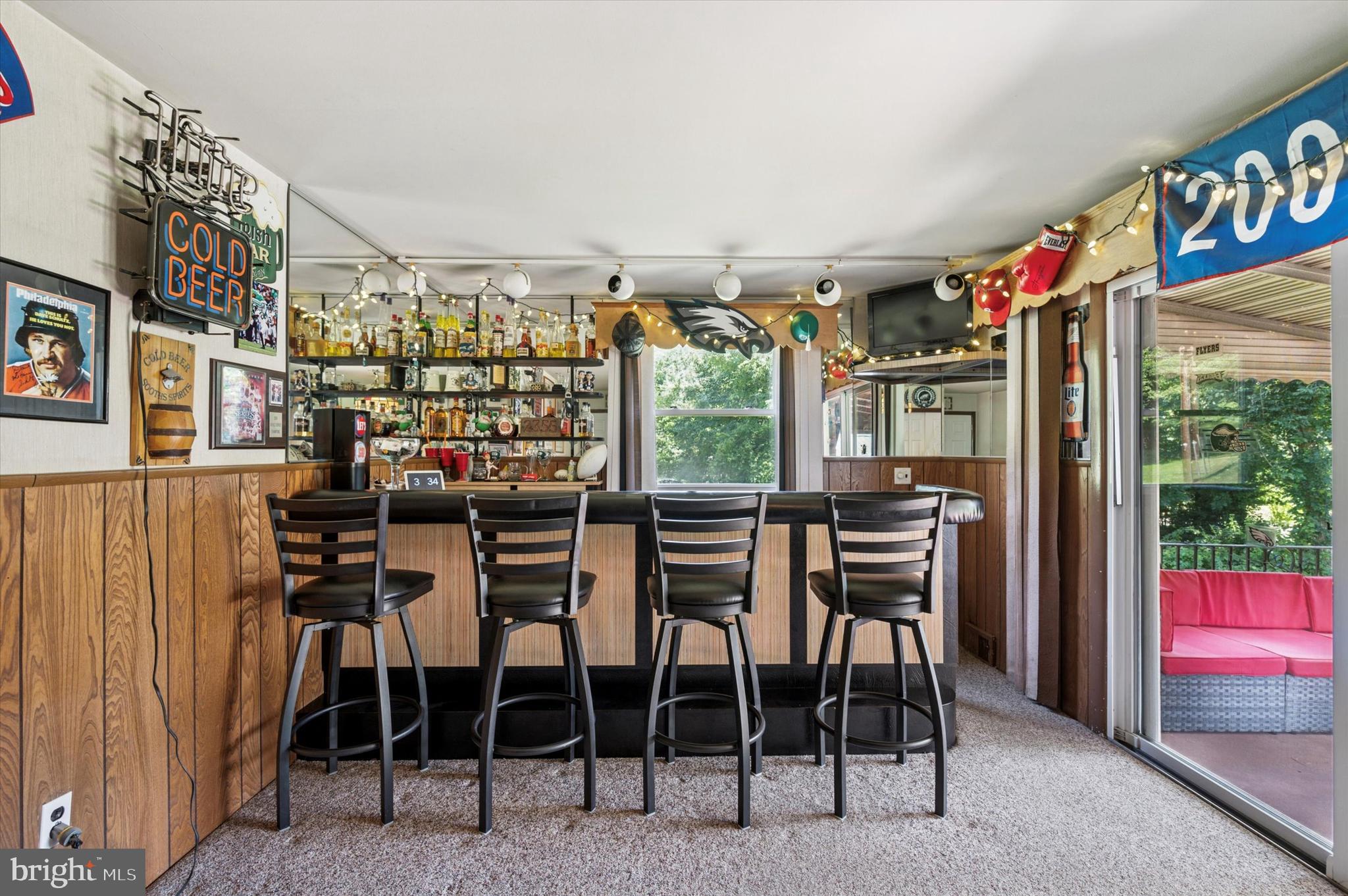 1007 Glen Road Wallingford, PA 19086 - Photo 23 of 50 a view of a dining room with furniture and chandelier
