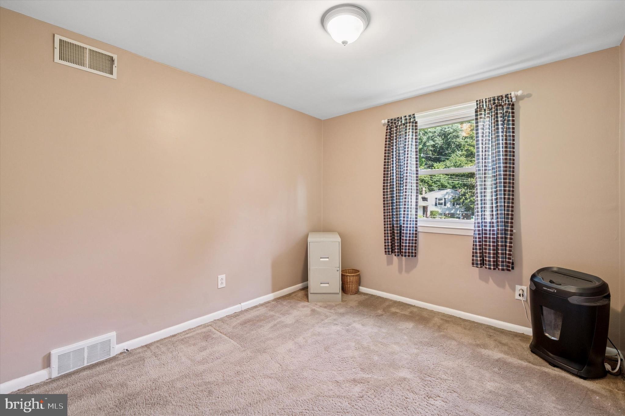 1007 Glen Road Wallingford, PA 19086 - Photo 30 of 50 a view of a livingroom with furniture and a window