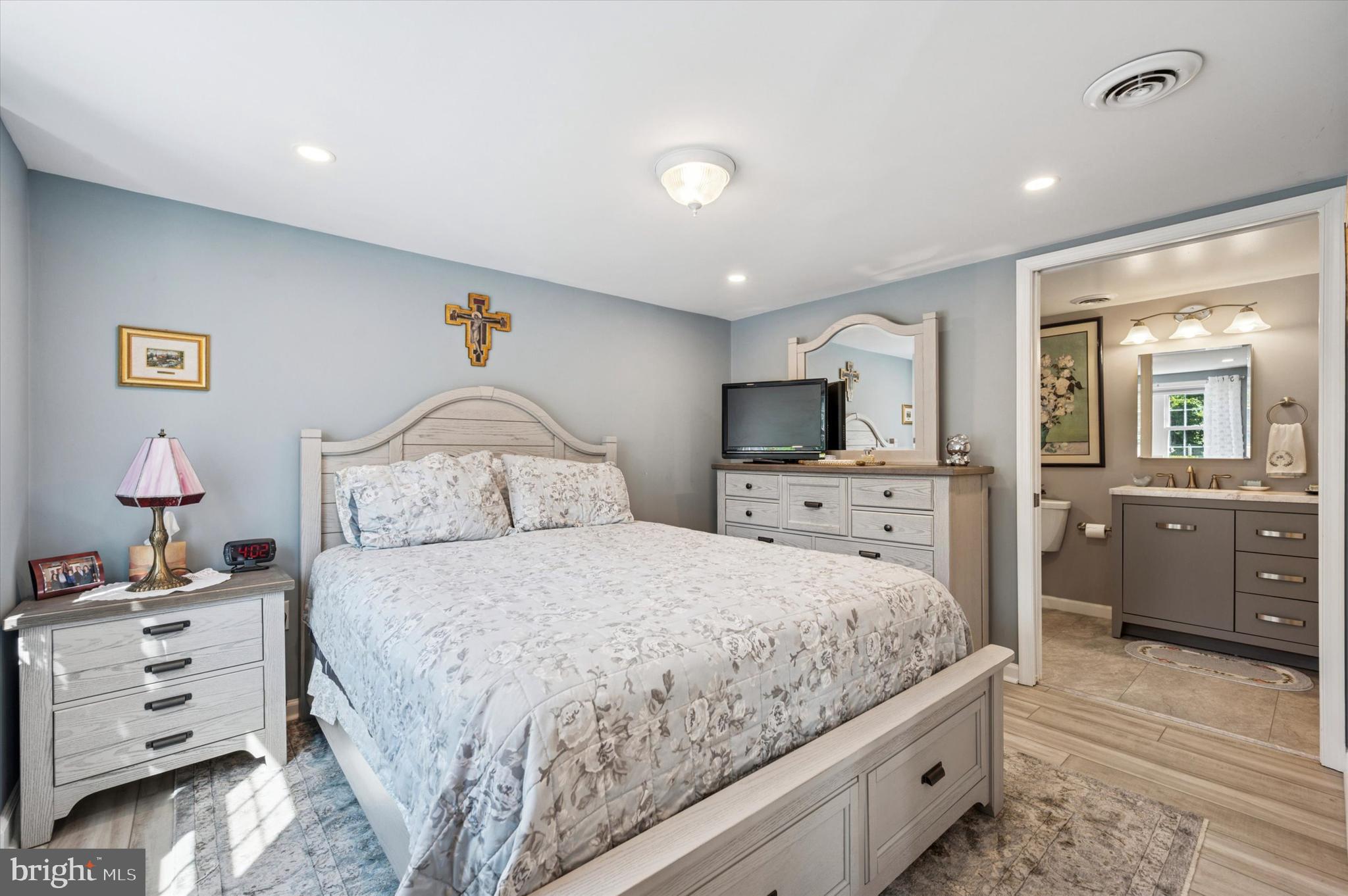 1007 Glen Road Wallingford, PA 19086 - Photo 41 of 50 a bedroom with a bed and a view of kitchen