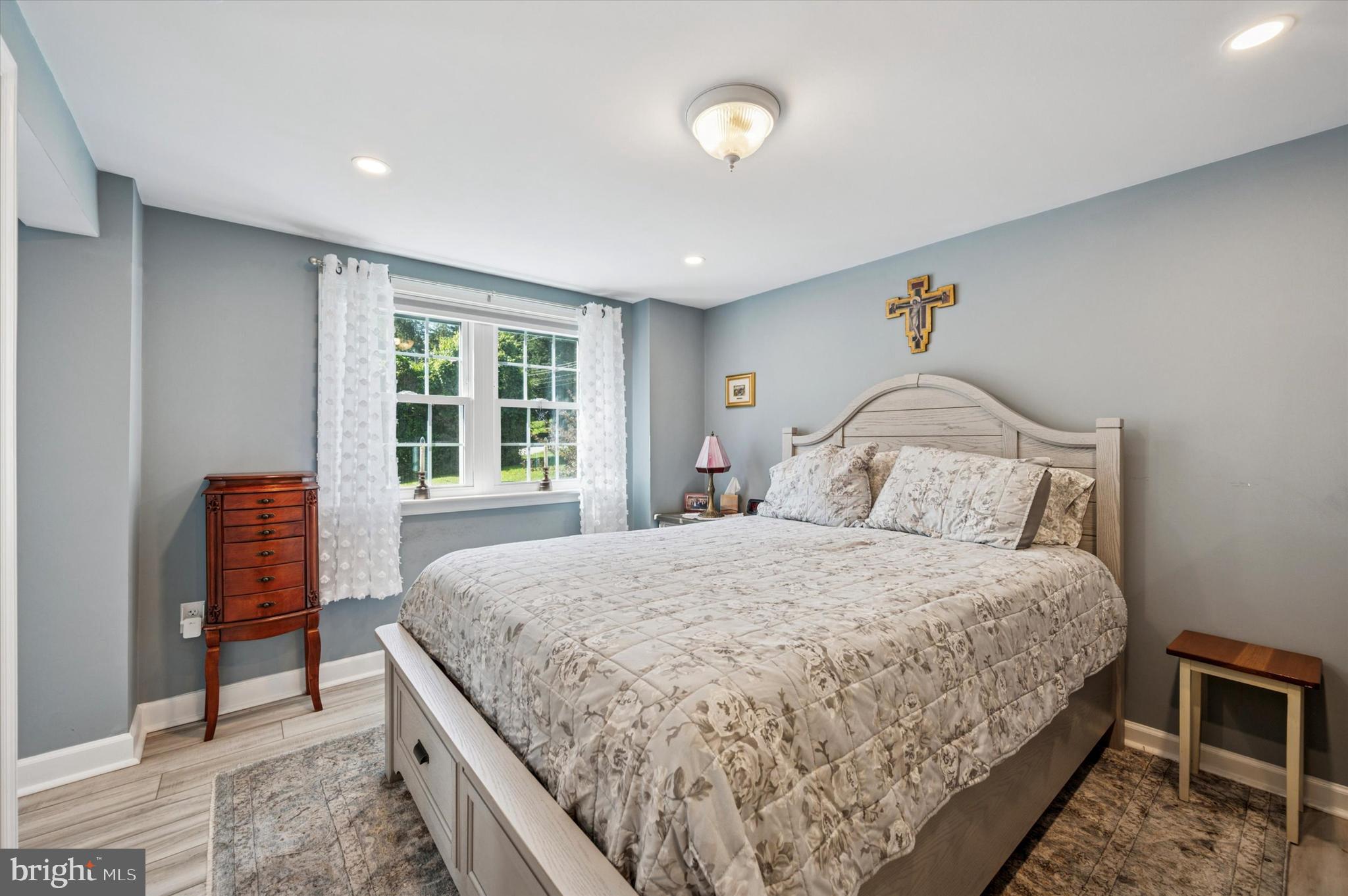 1007 Glen Road Wallingford, PA 19086 - Photo 42 of 50 a bedroom with a bed and window