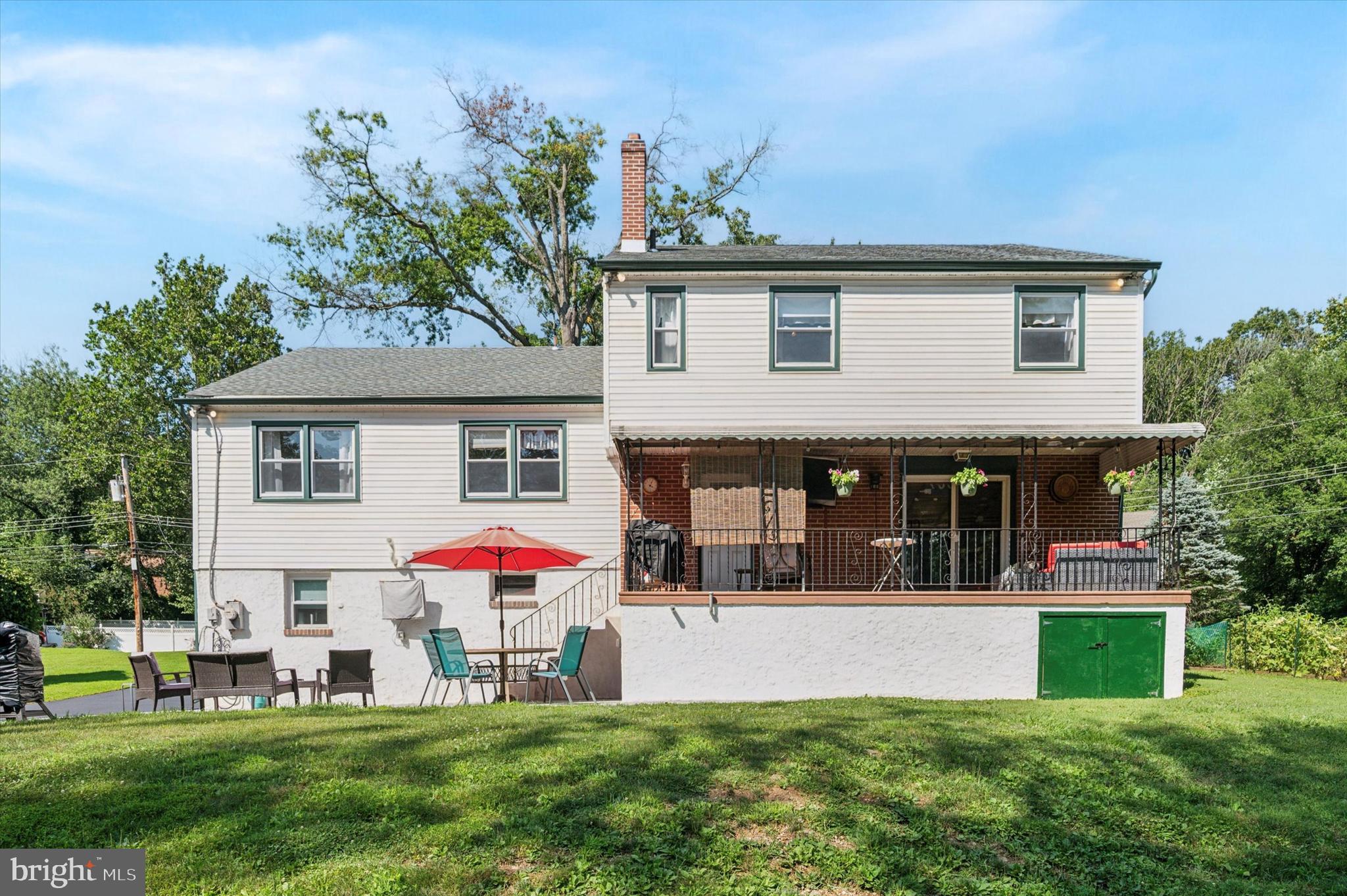 1007 Glen Road Wallingford, PA 19086 - Photo 48 of 50 a front view of house with yard