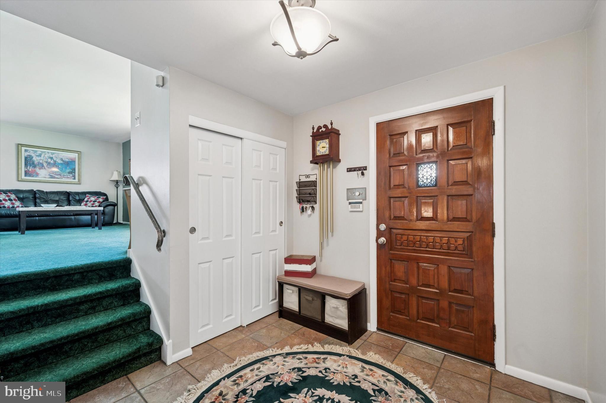 1007 Glen Road Wallingford, PA 19086 - Photo 5 of 50 a view of a bedroom with furniture and staircase