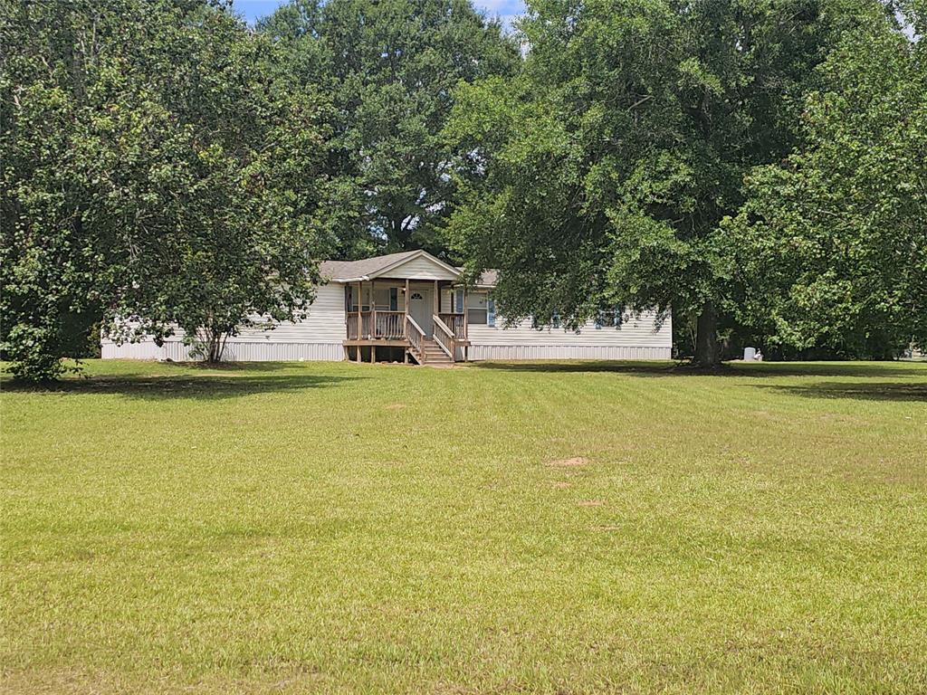 Situated back off the road on a 1.276 acre lcorner lot