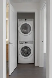 a utility room with washing machine
