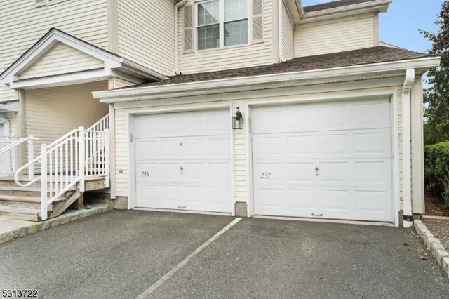 a view of a house with a garage