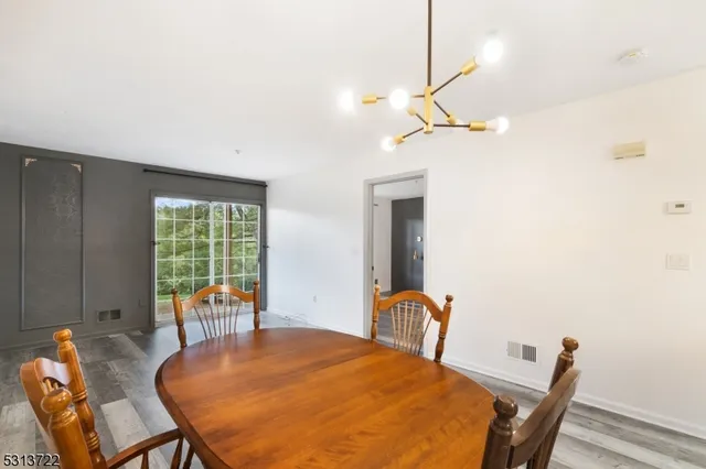 a view of a dining room with furniture