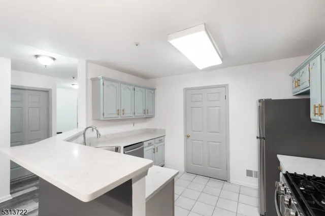 a room with a table and chairs