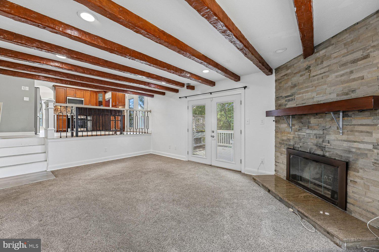 15764 Beau Ridge Drive Woodbridge, VA 22193 - Photo 13 of 58 a view of an empty room with a fireplace