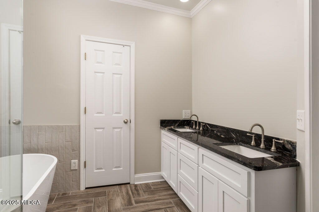 104 Browning Pointe Road Macon, GA 31216 - Photo 14 of 38 a bathroom with a granite countertop sink and a mirror