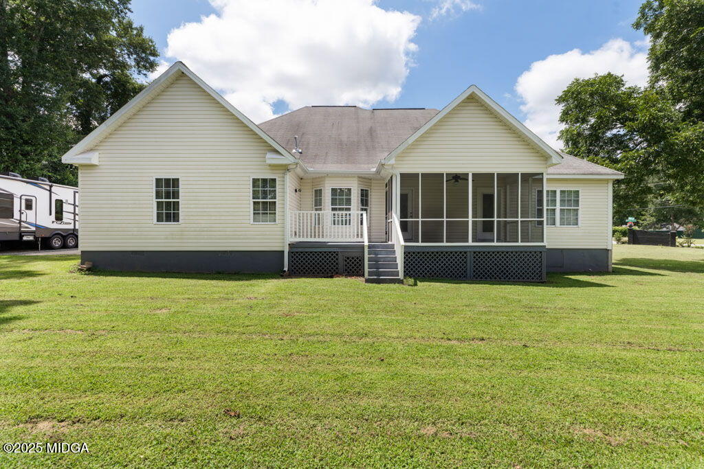 104 Browning Pointe Road Macon, GA 31216 - Photo 20 of 38 a front view of a house with a garden