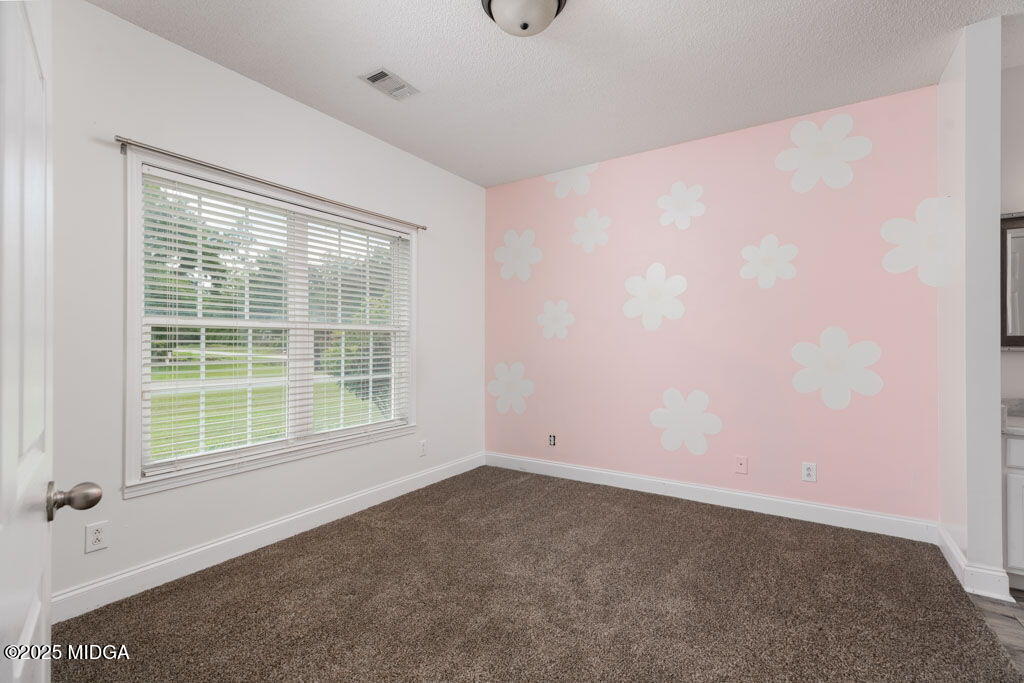104 Browning Pointe Road Macon, GA 31216 - Photo 24 of 38 an empty room with a window