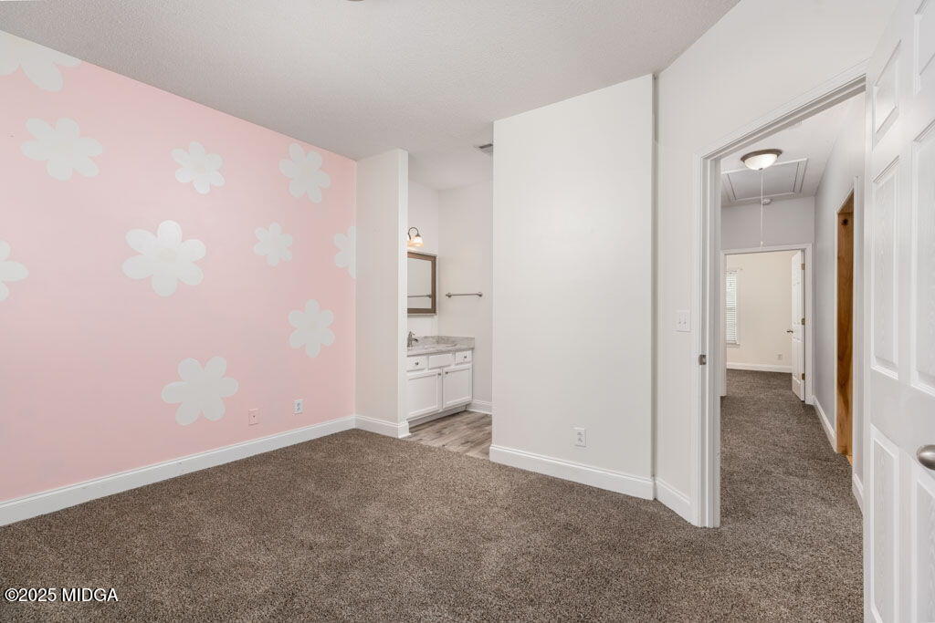 104 Browning Pointe Road Macon, GA 31216 - Photo 26 of 38 an empty room with closet and wooden floor