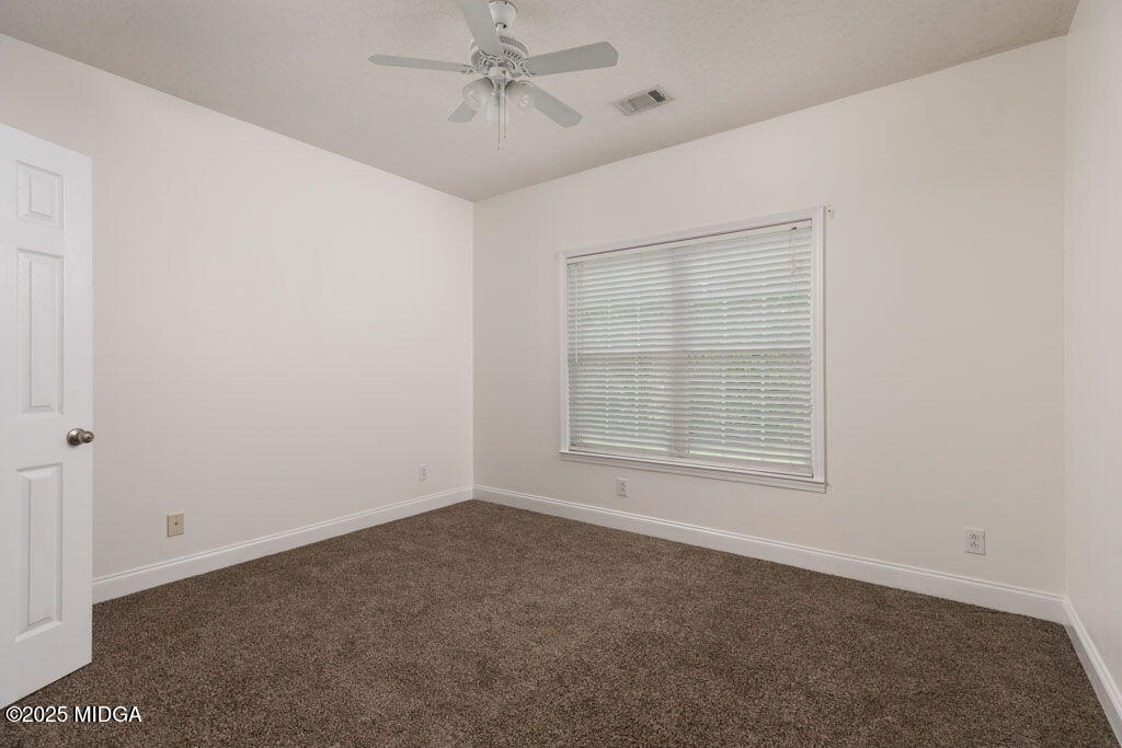 104 Browning Pointe Road Macon, GA 31216 - Photo 32 of 38 a view of an empty room with a window