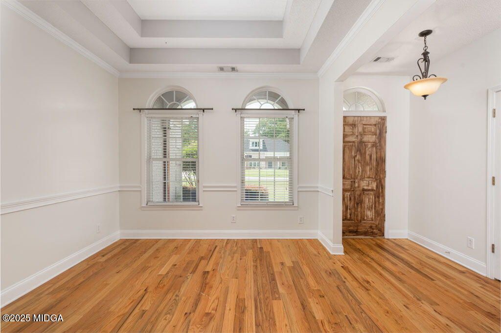 104 Browning Pointe Road Macon, GA 31216 - Photo 8 of 38 wooden floor in an empty room with a window