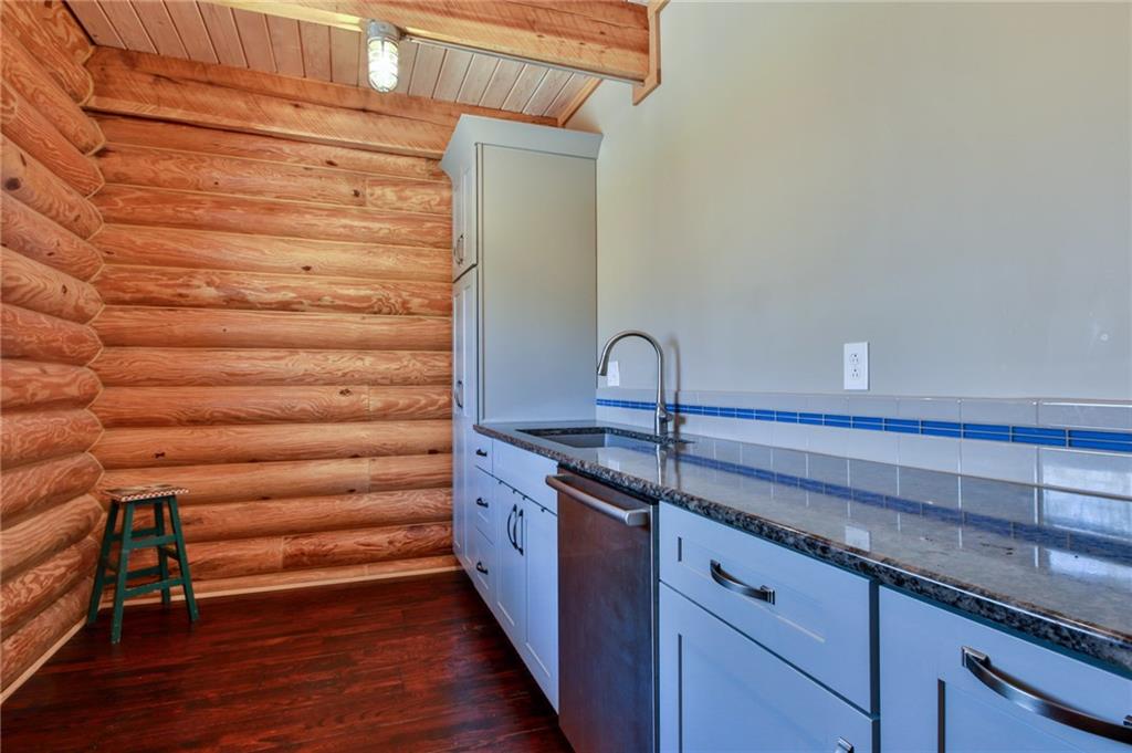 375 Midway Drive McKees Rocks, PA 15136 - Photo 12 of 25 Right off the kitchen is this handy butler's pantry with dishwasher, large sink and storage.