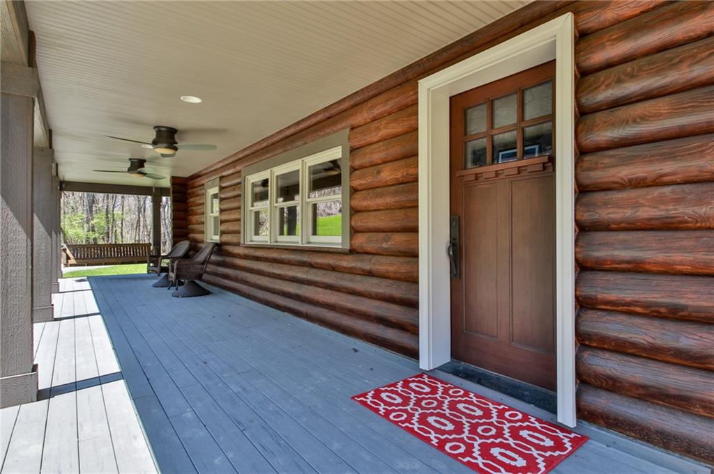 375 Midway Drive McKees Rocks, PA 15136 - Photo 3 of 25 You'll enjoy relaxing on the expansive porch that wraps around two sides.