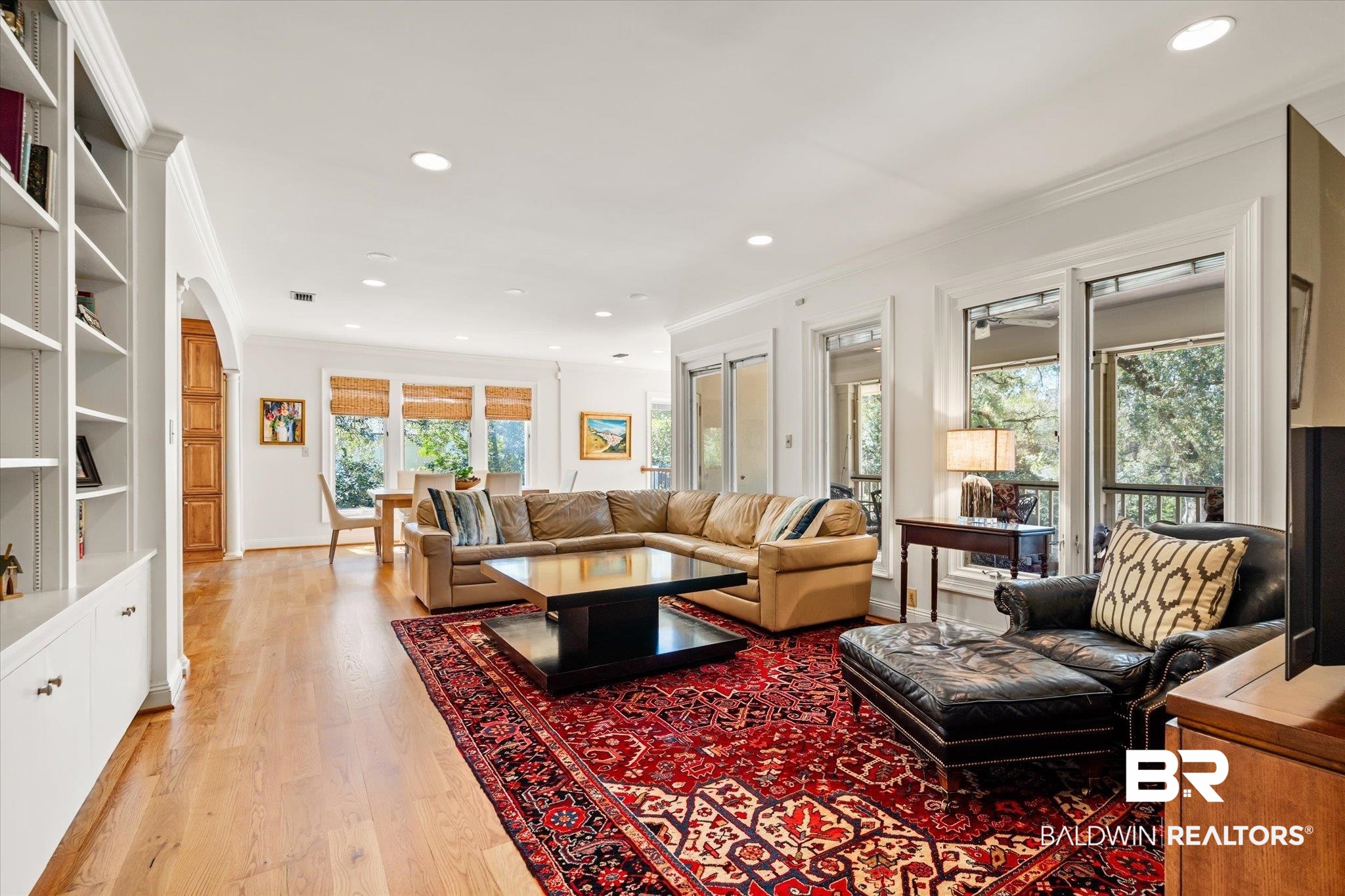 4 Kingsway Mobile, AL 36608 - Photo 15 of 44 Living room with recessed lighting, light wood-style floors, and ornamental molding