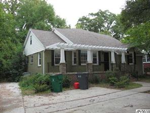 3711 Park Road Charlotte, NC 28209 - Photo 2 of 16 a front view of a house with a yard