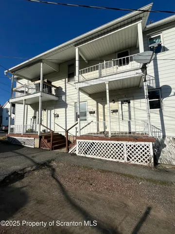 a view of a house with a deck