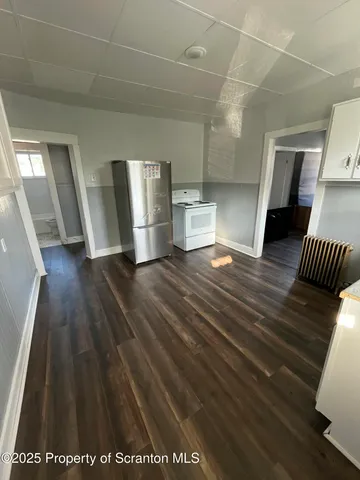 a view of livingroom with furniture and wooden floor