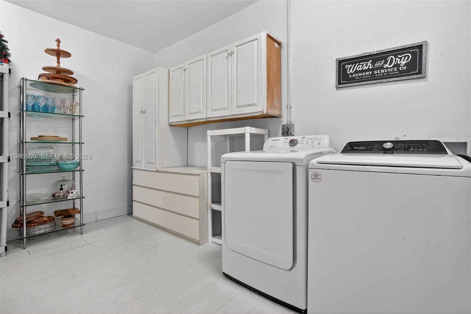 4710 Grant Street Hollywood, FL 33021 - Photo 34 of 56 a utility room with dryer and washer