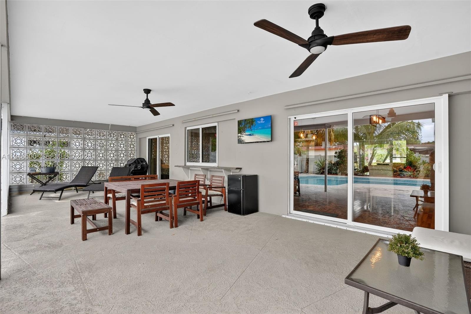 4710 Grant Street Hollywood, FL 33021 - Photo 37 of 56 a view of a livingroom with furniture and a window