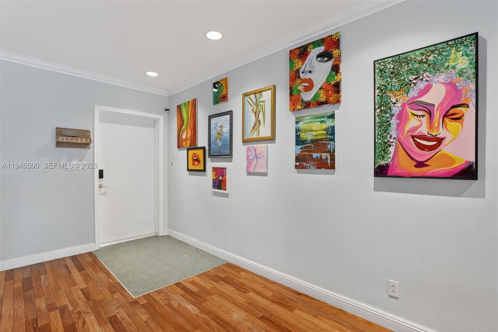 4710 Grant Street Hollywood, FL 33021 - Photo 4 of 56 a view of an entryway with wooden floor