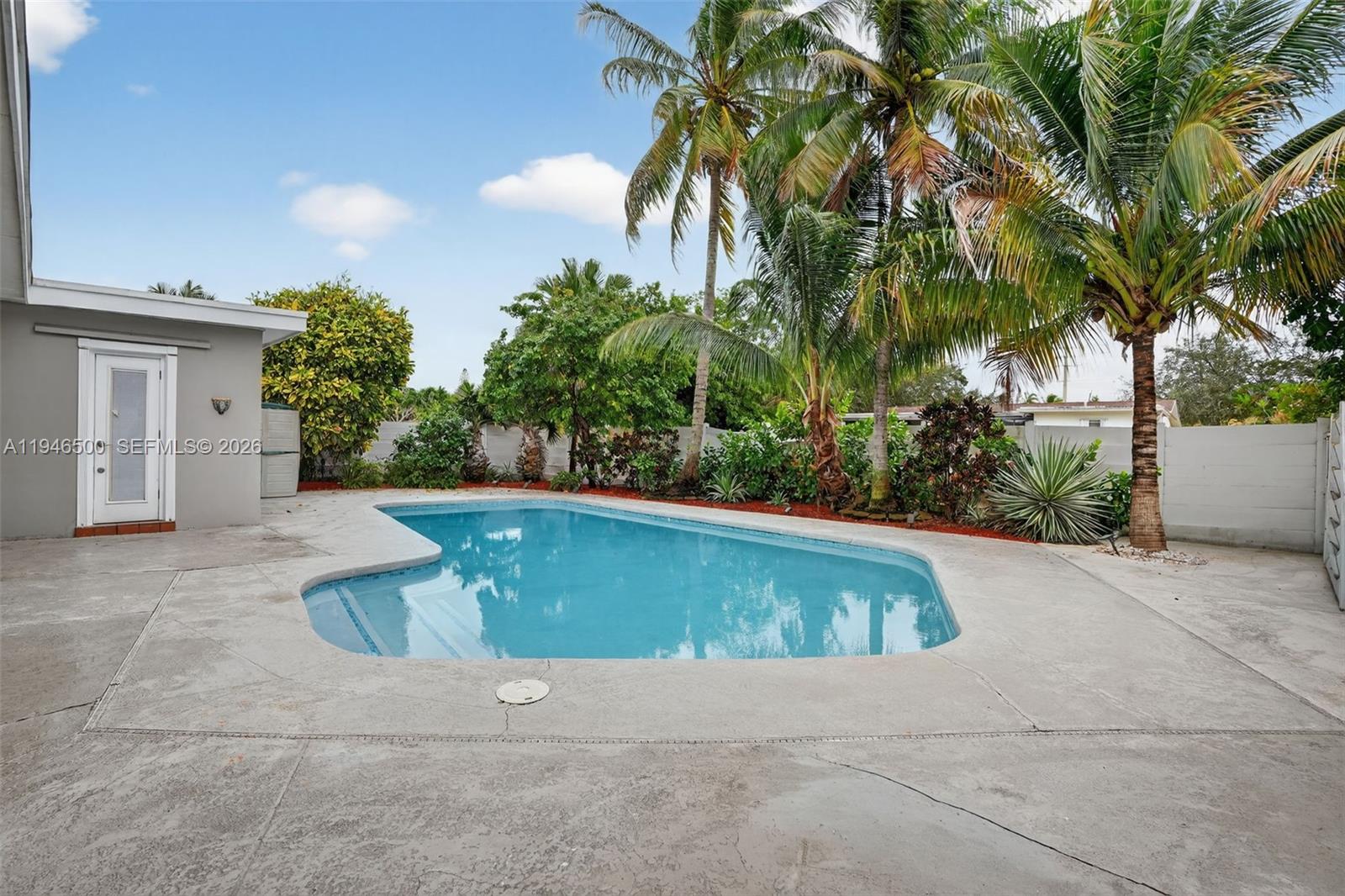 4710 Grant Street Hollywood, FL 33021 - Photo 42 of 56 a view of outdoor space yard and swimming pool