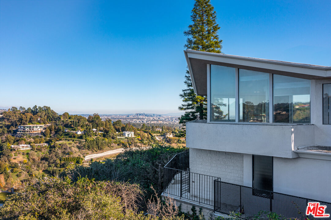 960 Stradella Road Los Angeles, CA 90077 - Photo 11 of 17 an aerial view of house with yard