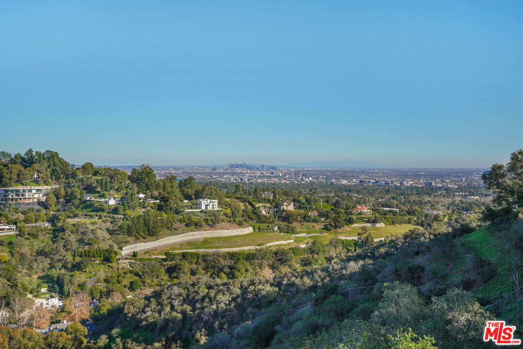 960 Stradella Road Los Angeles, CA 90077 - Photo 6 of 17 a view of a city with mountains in the background