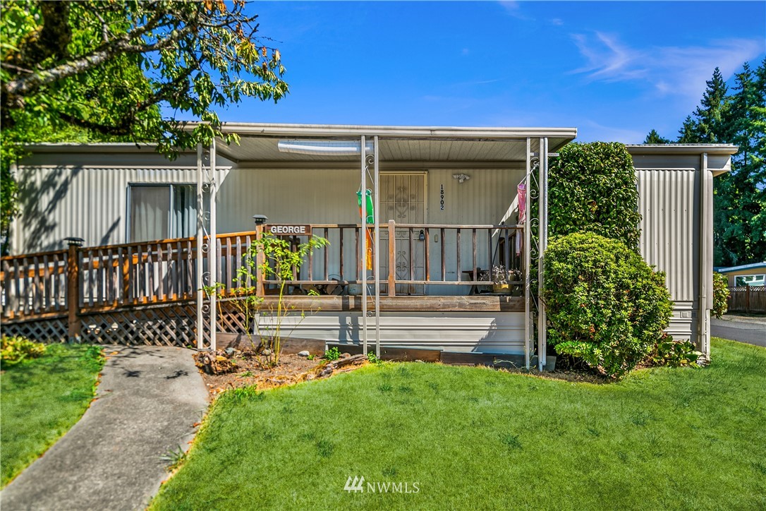 18902 128th Place Northeast Bothell, WA 98011 - Photo 1 of 15 front view of a house with a yard