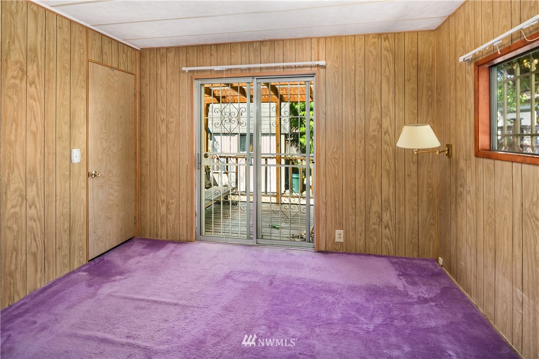 18902 128th Place Northeast Bothell, WA 98011 - Photo 11 of 15 a view of an empty room with a window