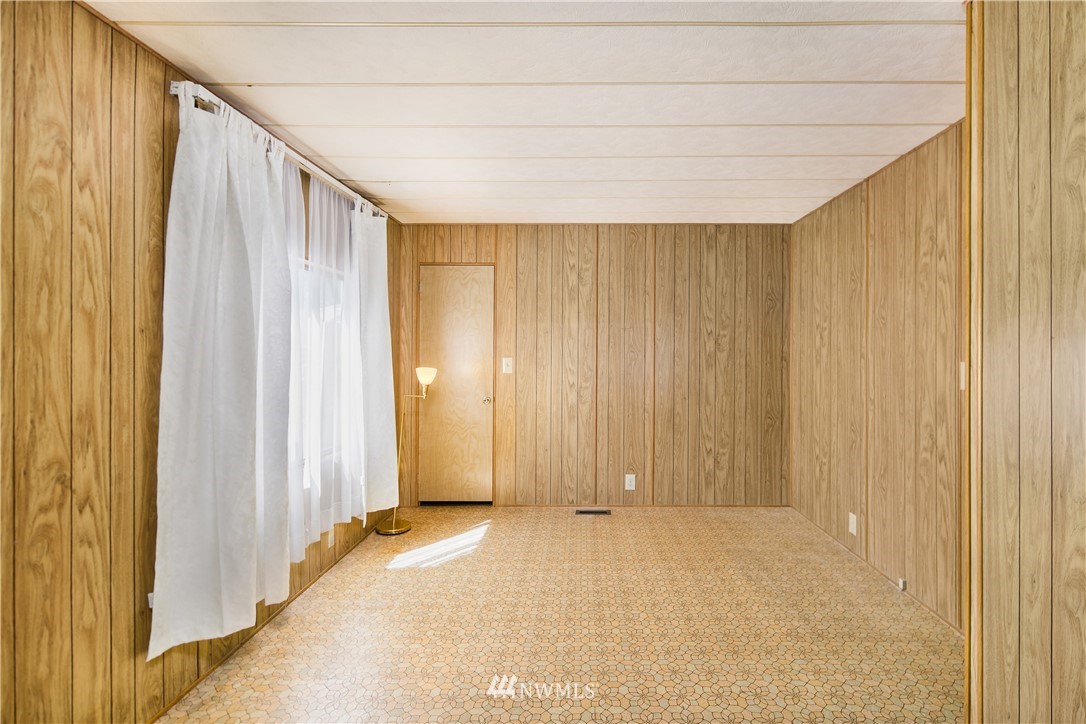 18902 128th Place Northeast Bothell, WA 98011 - Photo 12 of 15 a view of a room with a wooden door