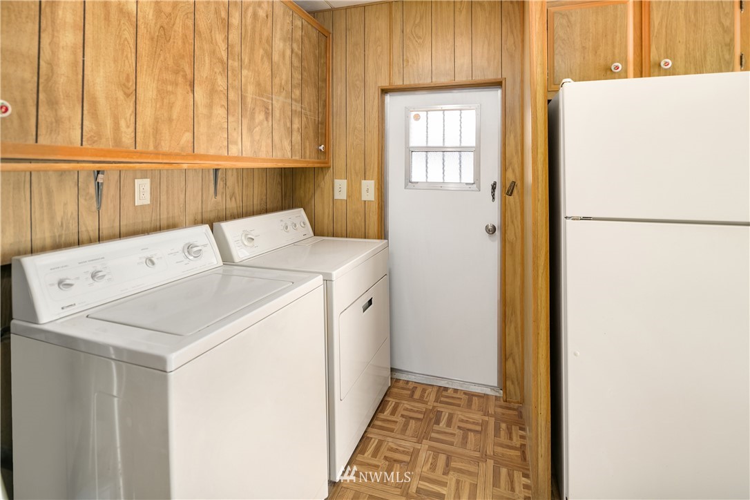 18902 128th Place Northeast Bothell, WA 98011 - Photo 13 of 15 a utility room with dryer and washer