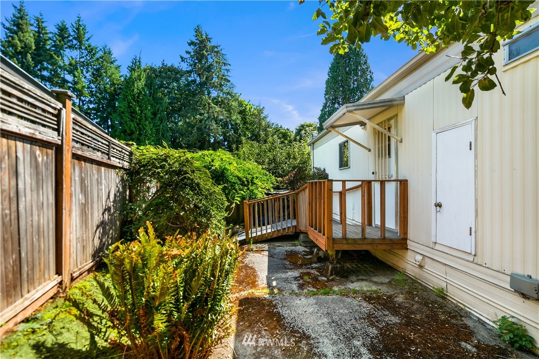18902 128th Place Northeast Bothell, WA 98011 - Photo 14 of 15 a view of a house with backyard and sitting area