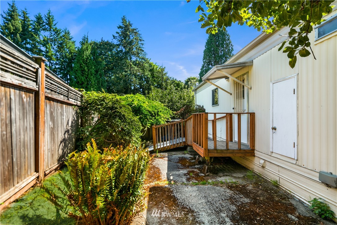 18902 128th Place Northeast Bothell, WA 98011 - Photo 2 of 15 a view of a house with backyard and sitting area