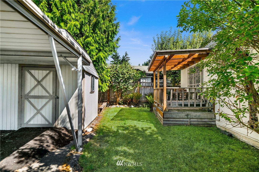 18902 128th Place Northeast Bothell, WA 98011 - Photo 3 of 15 a view of house with a yard from a balcony
