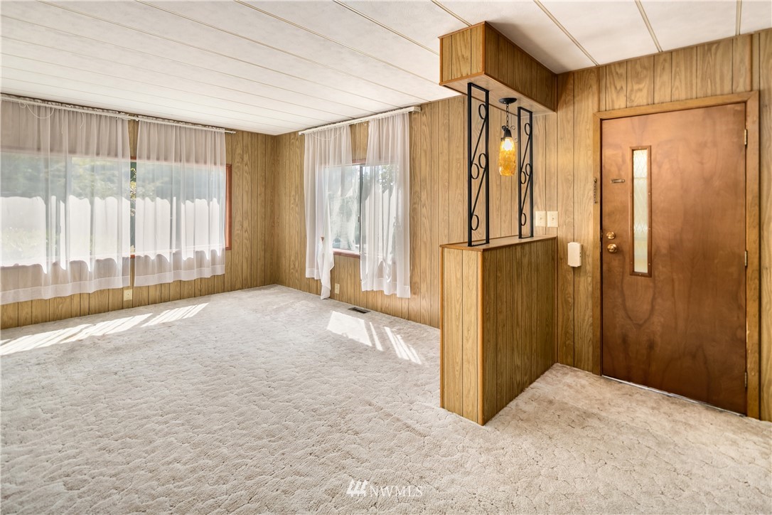18902 128th Place Northeast Bothell, WA 98011 - Photo 4 of 15 a view of a room with a large window