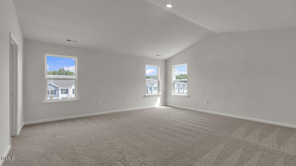 1305 Pavo Path Wendell, NC 27591 - Photo 23 of 55 a view of an empty room with a window