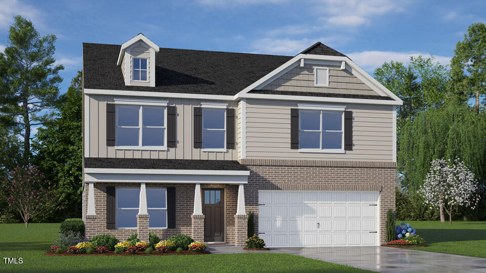 1305 Pavo Path Wendell, NC 27591 - Photo 55 of 55 a front view of a house with garden
