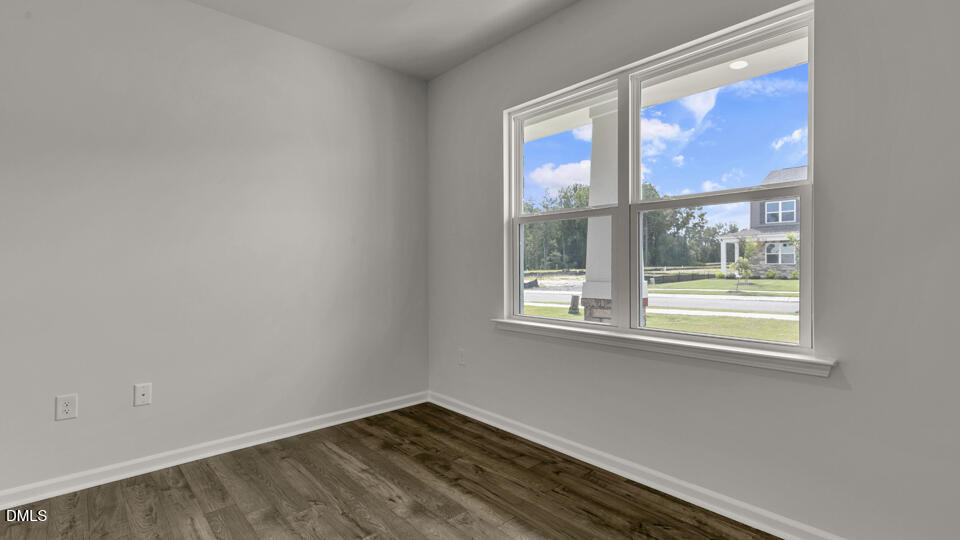 1305 Pavo Path Wendell, NC 27591 - Photo 6 of 55 a view of empty room with window