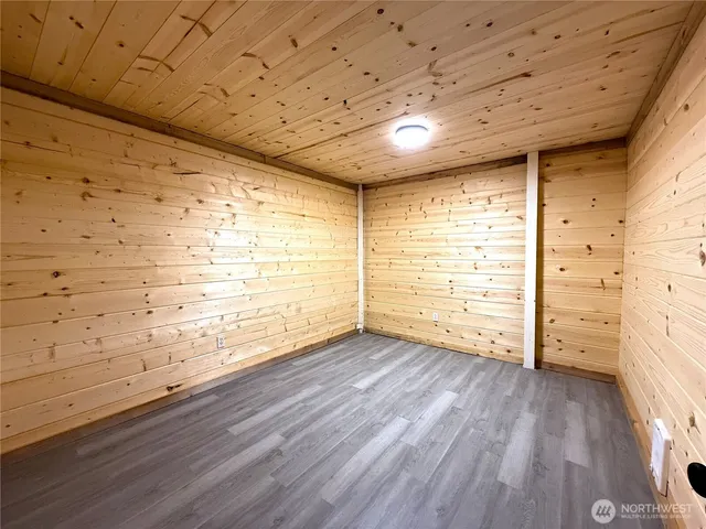 a view of a big room with wooden floor