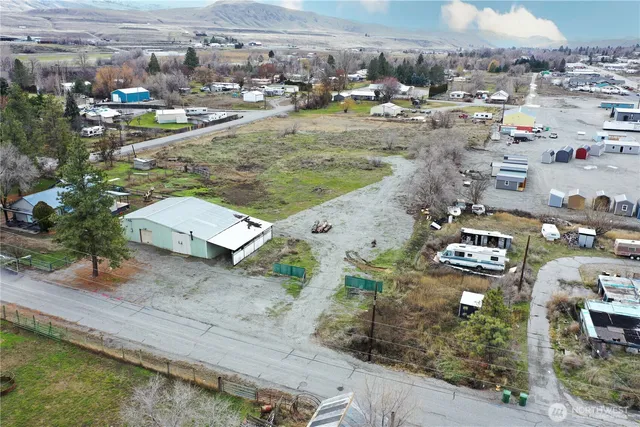 a view of a city with lawn chairs
