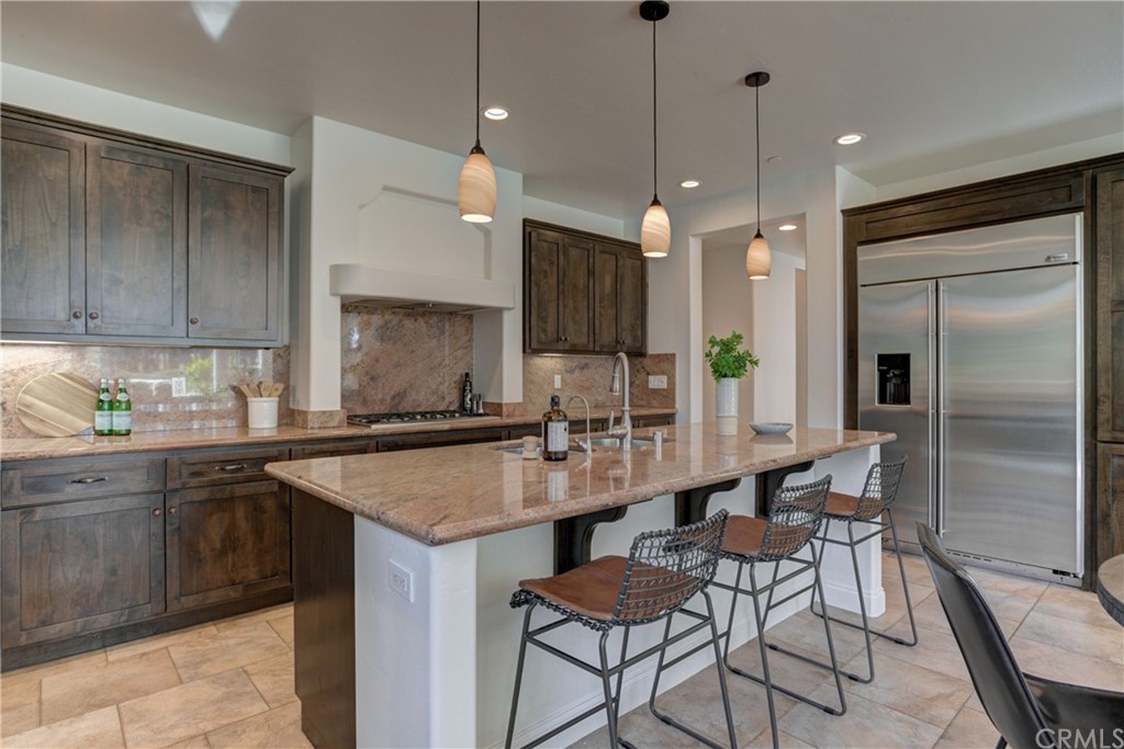1715 Trilogy Parkway Nipomo, CA 93444 - Photo 26 of 69 a kitchen with granite countertop a sink appliances and cabinets
