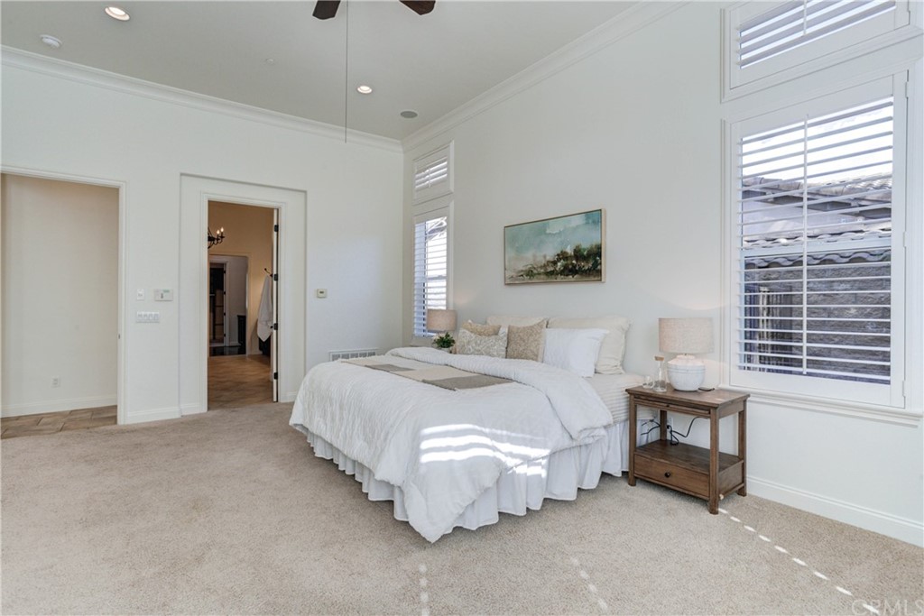 1715 Trilogy Parkway Nipomo, CA 93444 - Photo 45 of 69 a spacious bedroom with a bed and a window