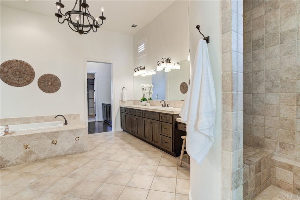 1715 Trilogy Parkway Nipomo, CA 93444 - Photo 47 of 69 a bathroom with a sink and a mirror